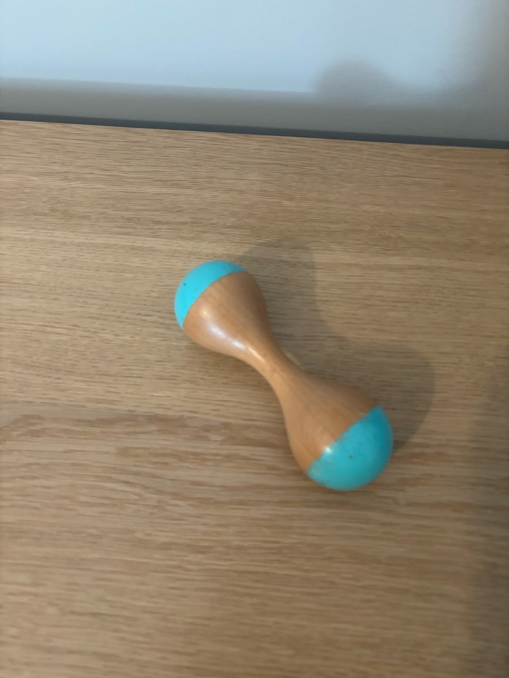 LOVEVERY Wooden Handheld Rattle with Turquoise Ends